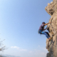 Mann am Klettern am Klettersteig